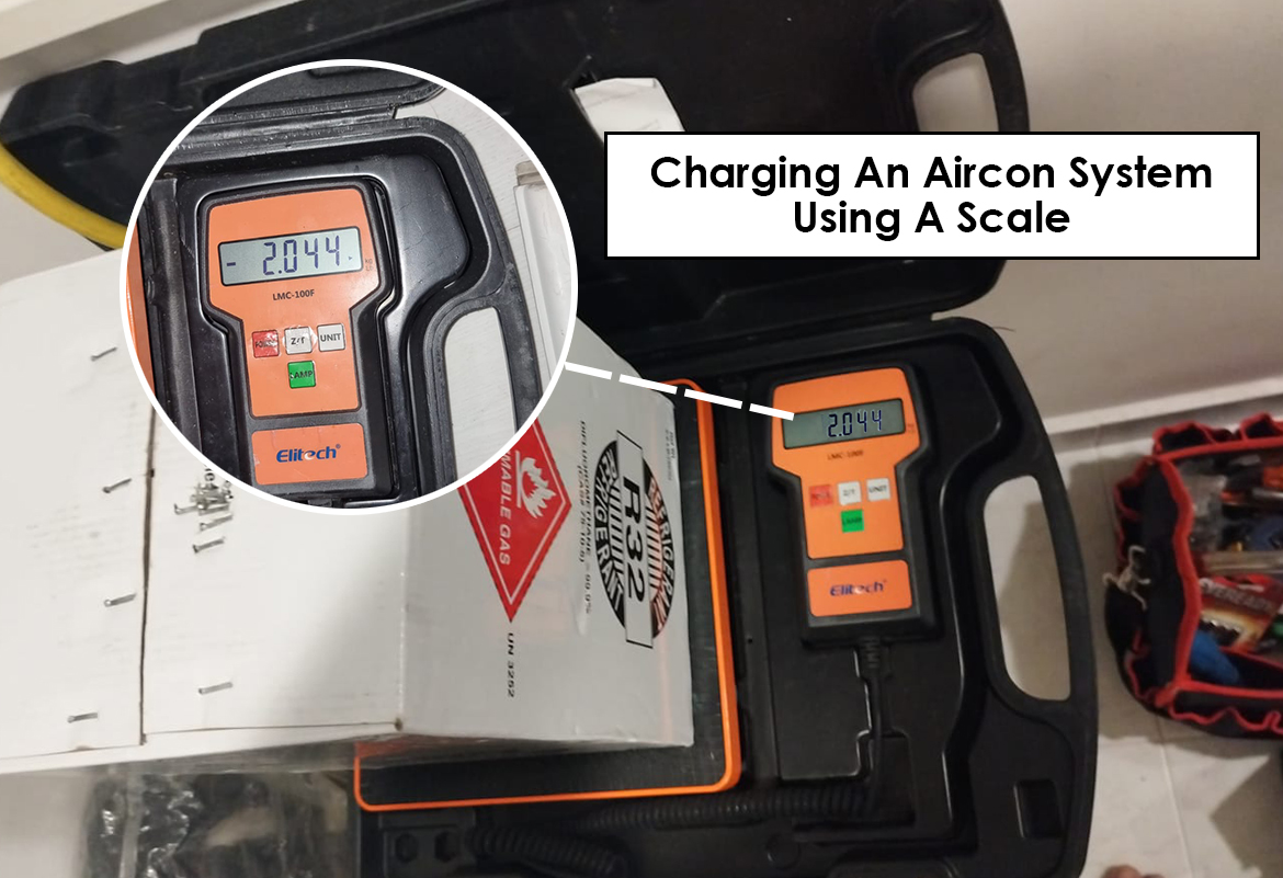 Charging an aircon system using a scale